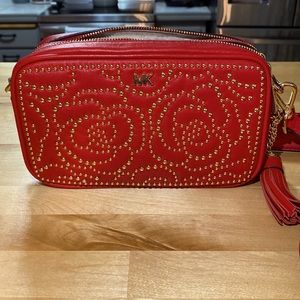 Michael Kors Red with matching wallet. Barely used